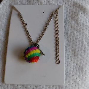Necklace with ball pendant.